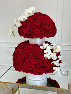 
                    
                      Luxury Tall Red Roses and Orchids by Le Boutique Royal
                    
                  