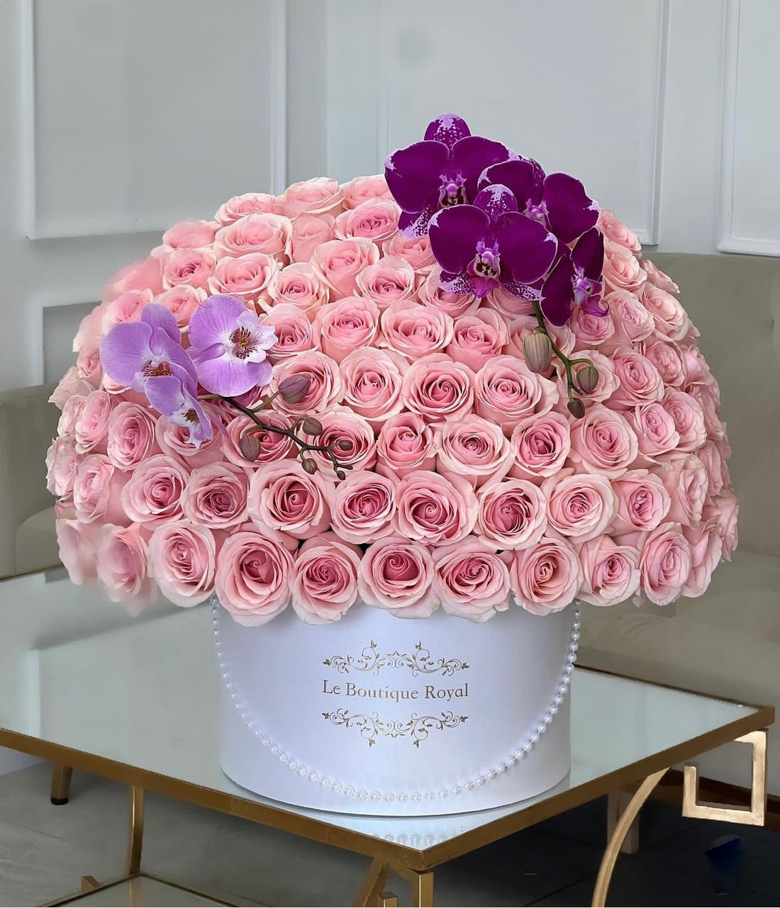 100 rosas rosadas con orquídeas