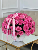 Rosas rosadas en un florero