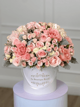 Mezcla premium de flores en colores rosas.