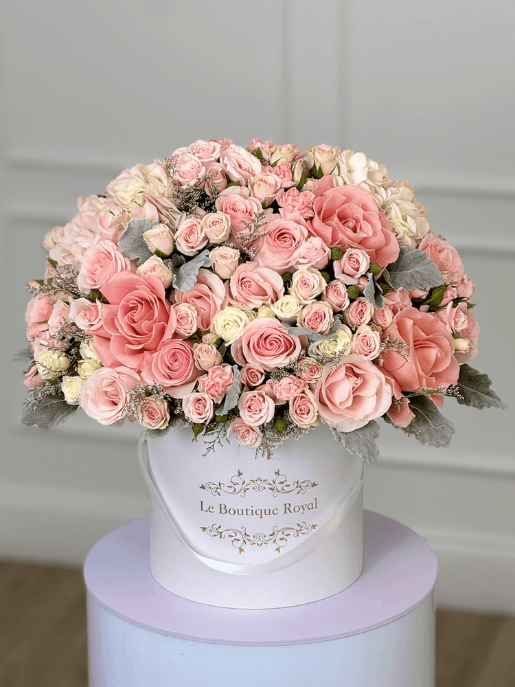Mezcla premium de flores en colores rosas.