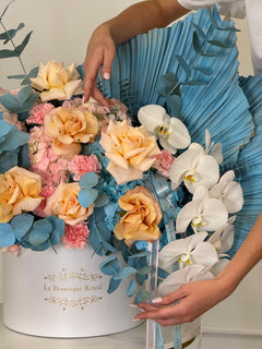 
                    
                      Blue and Peach Mix of Blooms
                    
                  