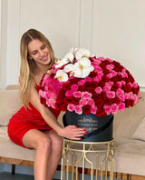 pink and red roses with a model