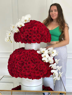 
                    
                      Luxury Tall Red Roses and Orchids by Le Boutique Royal
                    
                  