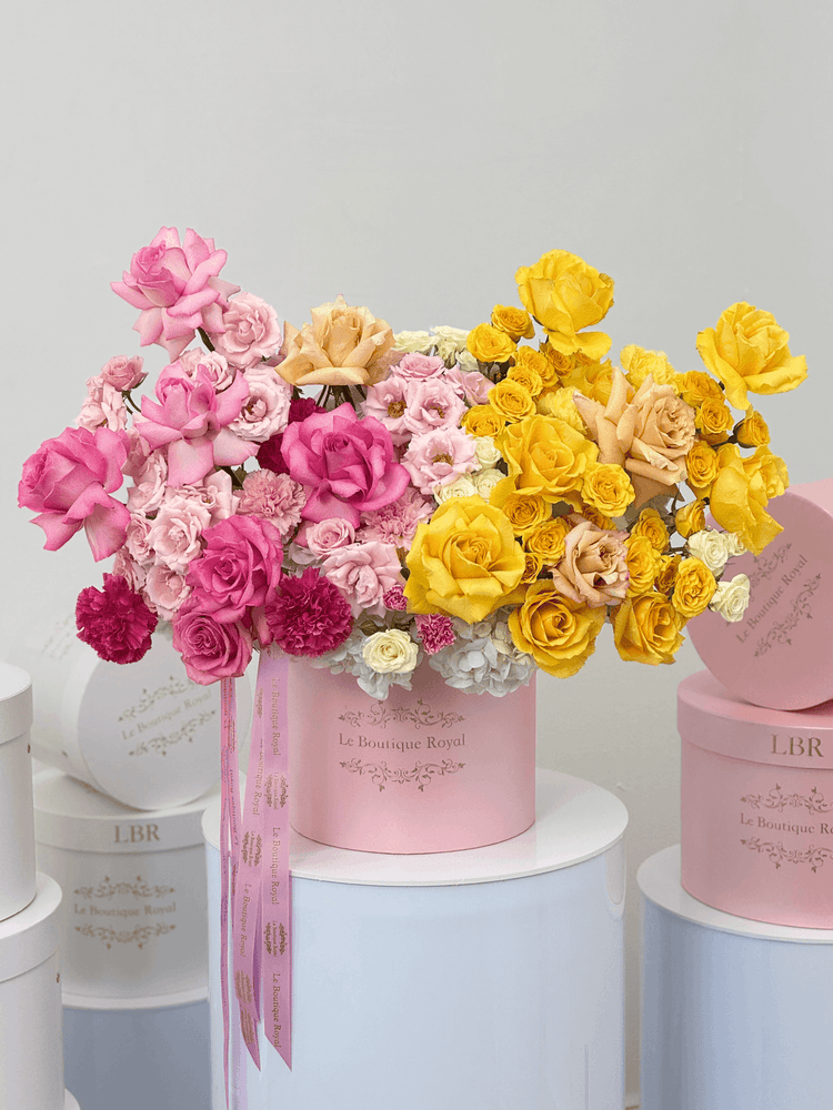 Rosas amarillas y rosadas premium de Le Boutique Royal