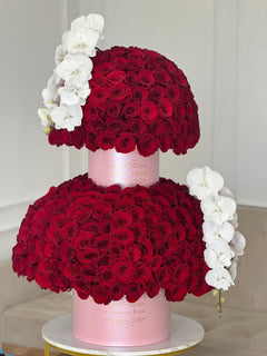 
                    
                      Luxury Tall Red Roses and Orchids by Le Boutique Royal
                    
                  
