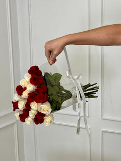 
                    
                      Two Dozen Red and White Roses in Bloom Bag – Luxury Flower Delivery Miami | Le Boutique Royal
                    
                  