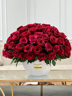 
                    
                      Rosas en un florero
                    
                  