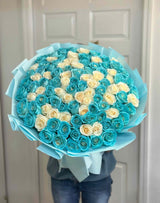 Luxury Tiffany blue and white rose bouquet featuring premium long stem roses in elegant blue wrapping.