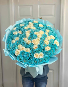 
                    
                      Luxury Tiffany blue and white rose bouquet featuring premium long stem roses in elegant blue wrapping.
                    
                  
