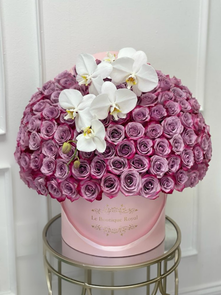 purple roses with orchids