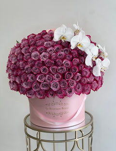 
                    
                      purple roses with orchids
                    
                  
