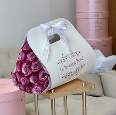 
                    
                      12 Rosas Púrpuras en Bloom Bag – Entrega de Flores de Lujo en Miami | Le Boutique Royal
                    
                  