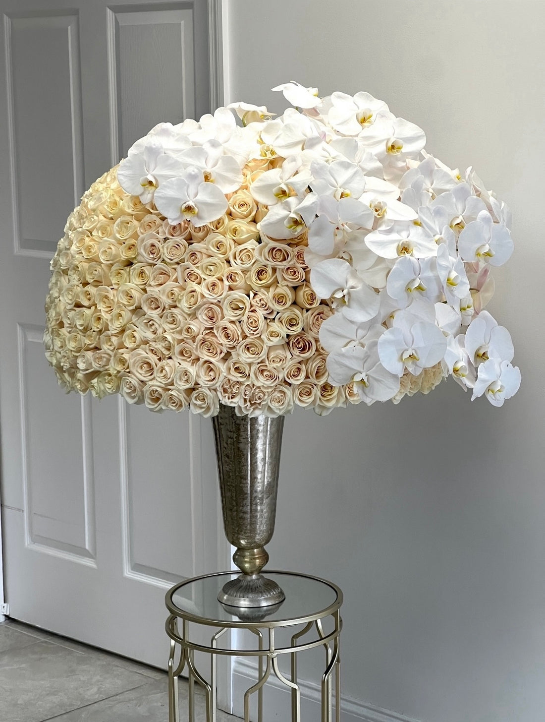 white roses with orchids