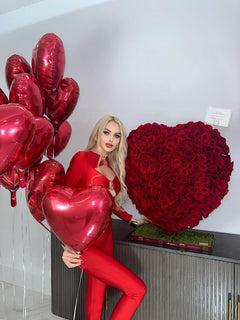 
                    
                      A Model Next To Luxury Red Rose Heart
                    
                  