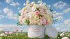 Luxury floral arrangement by Le Boutique Royal in Miami, featuring fresh flowers under a bright blue sky.