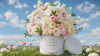 Luxury floral arrangement by Le Boutique Royal in Miami, featuring fresh flowers under a bright blue sky.