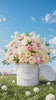 Luxury pink and white flower arrangement with roses, hydrangeas and orchids by Le Boutique Royal